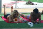 Pam sunbathing with Ashmit in the Bigg Boss house.JPG